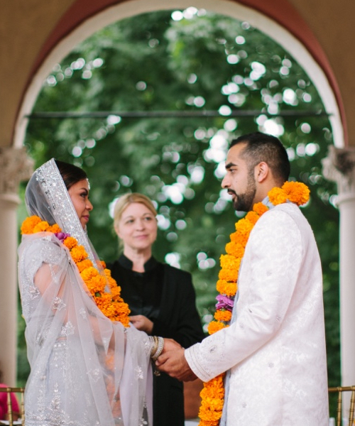 bride and groom standing toe to toe